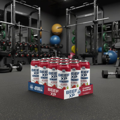 Box of Applied Nutrition Beef XP Cherry Slushie protein cans on a gray background
