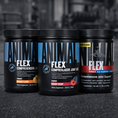 Three containers of Animal Flex supplement on a dark surface with a blurred background