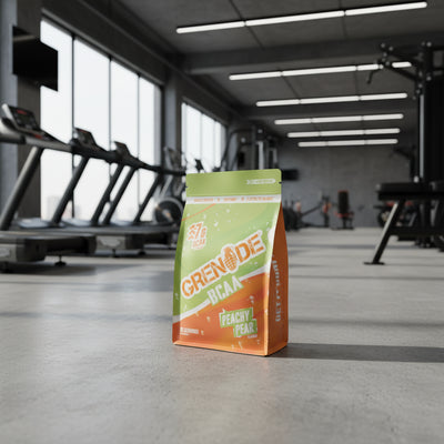 Grenade BCAA supplement package with strawberry mango flavour on a gym background