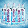 Five bottles of Actiph whey protein powder on a aqua background