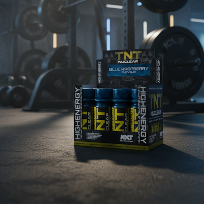 Supplement boxes with 'TNT Nuclear' branding in a gym setting