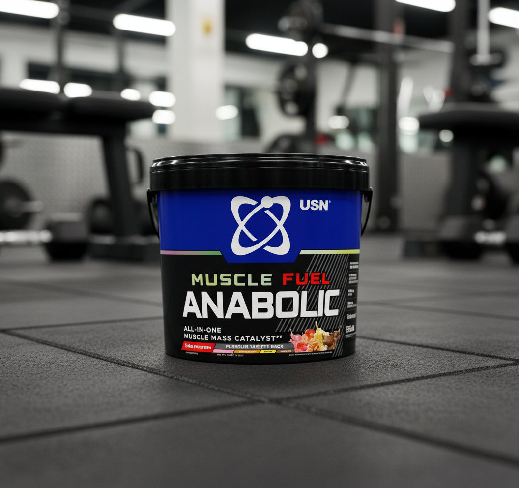 USN Muscle Fuel Anabolic supplement container on a gym floor