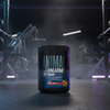 Container of Animal Creatine HMB+ supplement with gym equipment in the background
