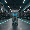 ABE All Black Everything pre-workout supplement bottle blue lagoon on a gym background
